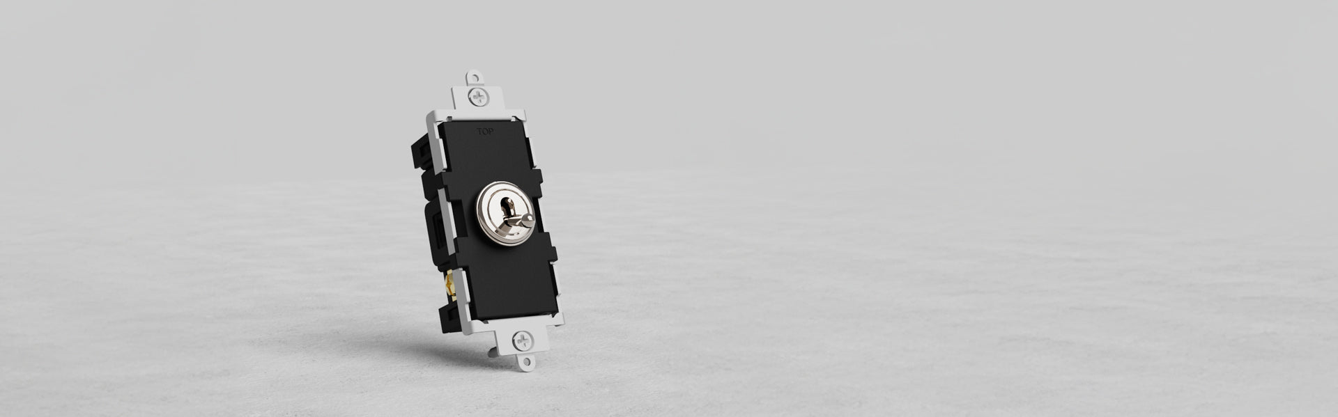 A close-up of a nickel electrical switch with a round toggle in the center, mounted on a white base, set against a light gray background.